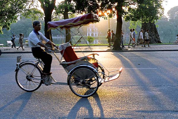 Cyclo is one of typical vehicles in Hanoi, Vietnam tour package